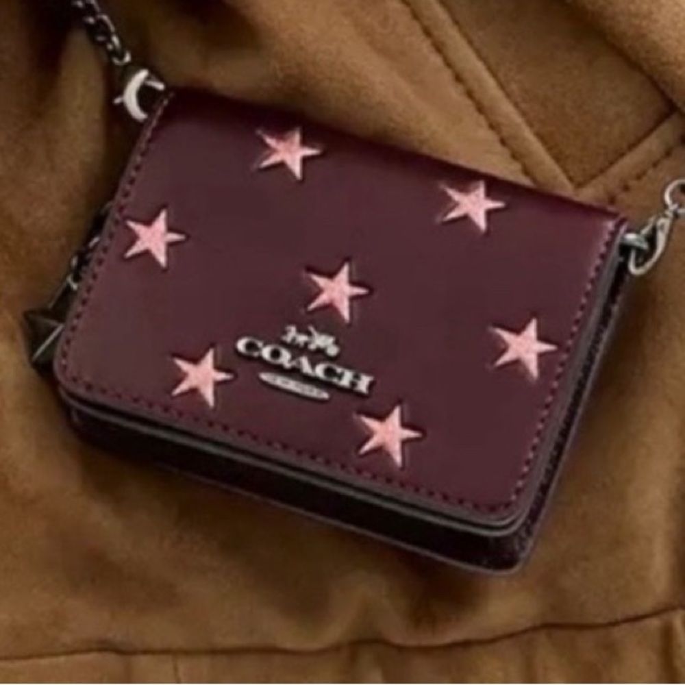 Coach Boxed Mini Burgundy Wallet On A
Chain With Star Print